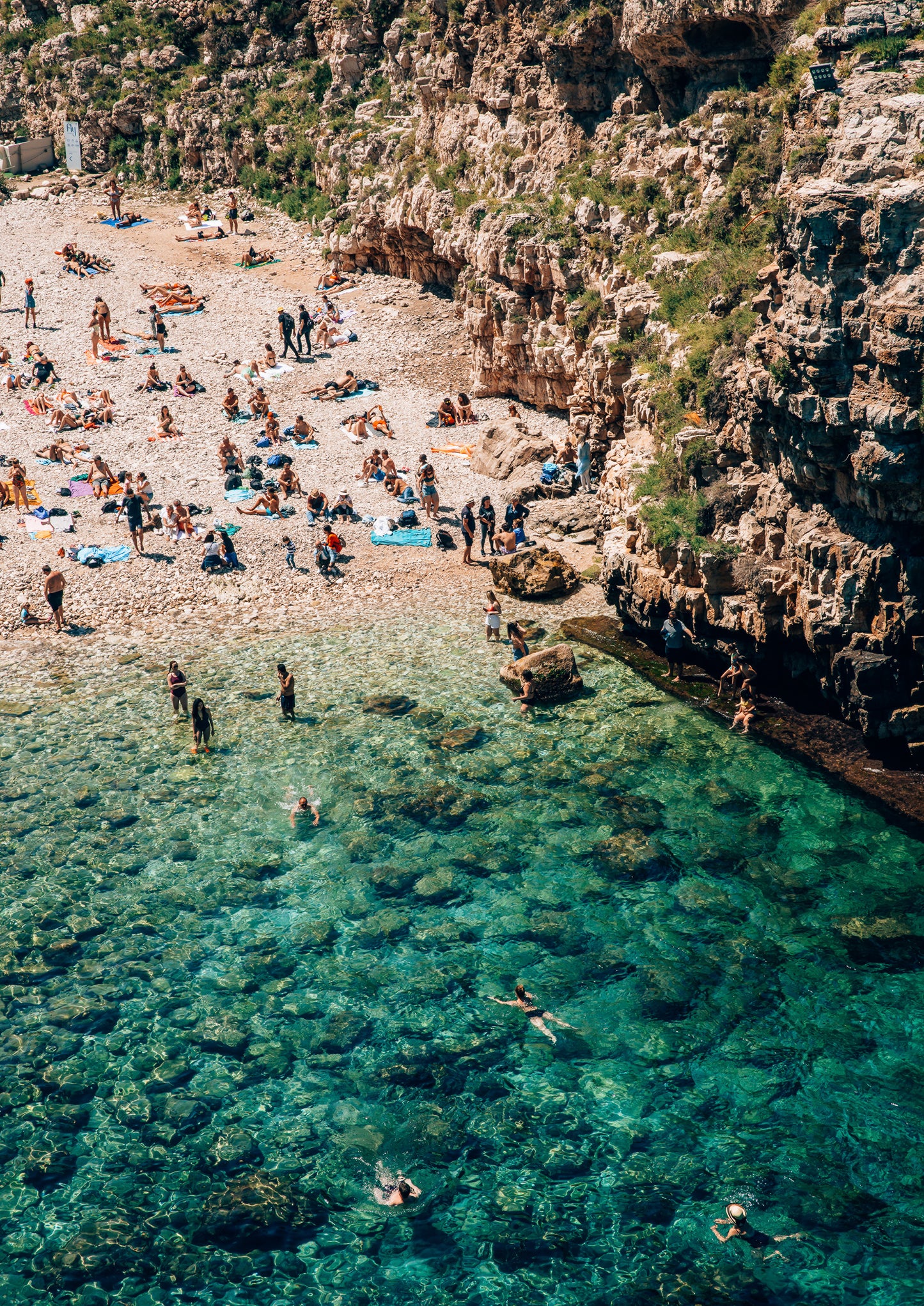 Swimming at Polignano a Mare Beach, Italy