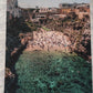 Swimming at Polignano a Mare Beach, Italy